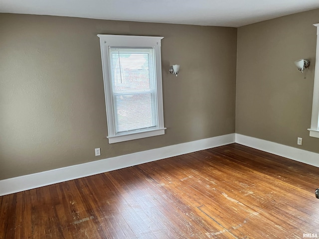 626 W Edwards St, Springfield, IL 62704 - empty room featuring hardwood / wood-style flooring and baseboards