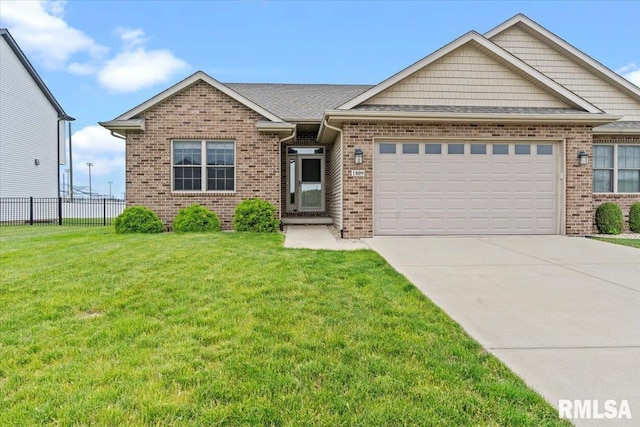 1809 Spartan Dr, Chatham, IL 62629 - view of front of house featuring an attached garage, brick siding, and concrete driveway
