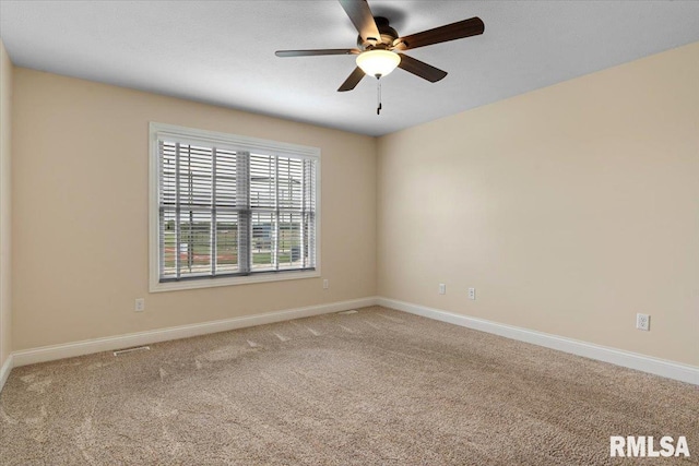 1809 Spartan Dr, Chatham, IL 62629 - empty room featuring a ceiling fan, baseboards, and light colored carpet
