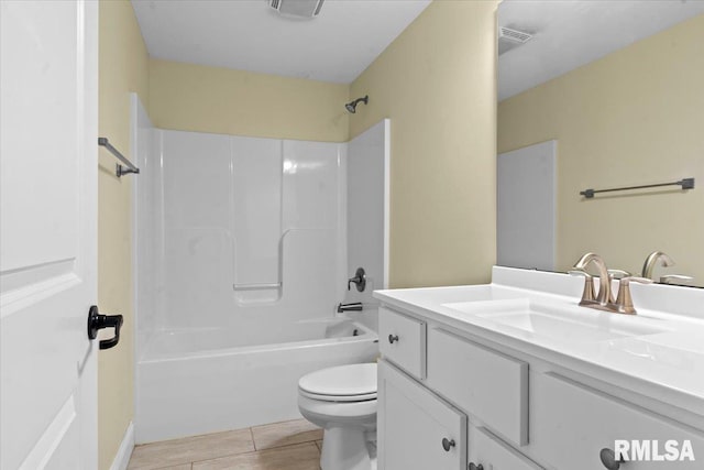 1809 Spartan Dr, Chatham, IL 62629 - full bathroom with vanity, toilet, shower / washtub combination, and wood finished floors