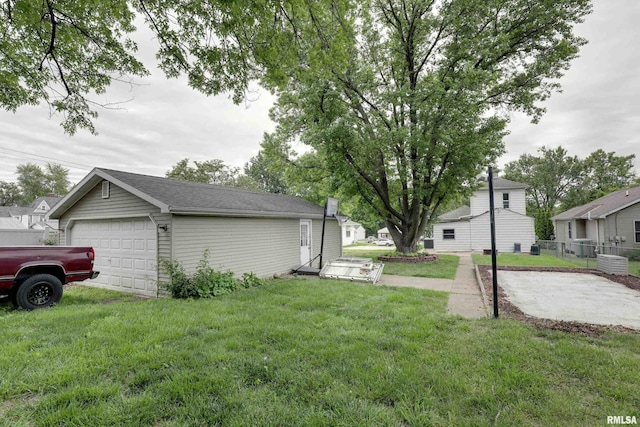 2911 Hampshire St, Quincy, IL 62301 - view of yard featuring a garage