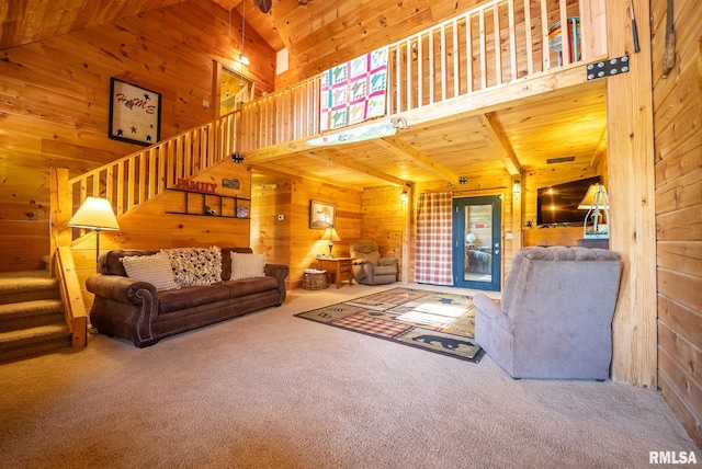2061 N 425th St, Vandalia, IL 62471 - carpeted living area featuring wood walls, wood ceiling, and stairs