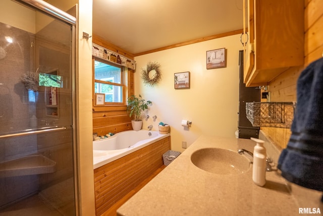 2061 N 425th St, Vandalia, IL 62471 - bathroom with a sink, a bath, a stall shower, and crown molding
