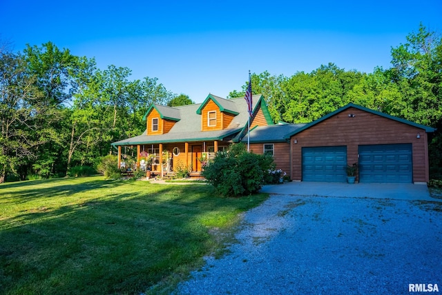 2061 N 425th St, Vandalia, IL 62471 - view of front facade with dirt driveway, a front yard, covered porch, and an attached garage