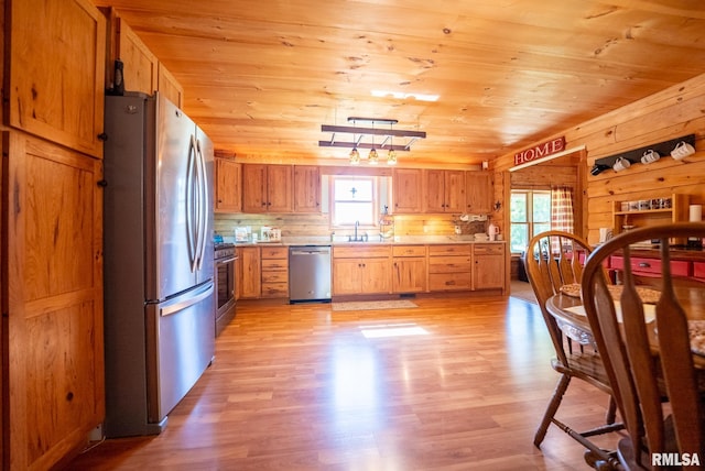 2061 N 425th St, Vandalia, IL 62471 - kitchen with appliances with stainless steel finishes, healthy amount of natural light, a sink, wood ceiling, and light countertops