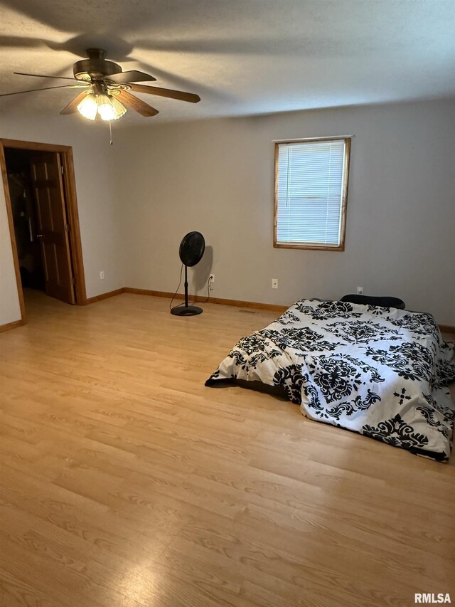 515 Morgan St, Chapin, IL 62628 - bedroom featuring light wood-type flooring, baseboards, and ceiling fan