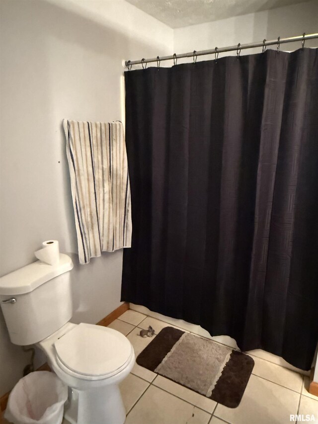 515 Morgan St, Chapin, IL 62628 - bathroom featuring toilet, tile patterned flooring, and a shower with curtain