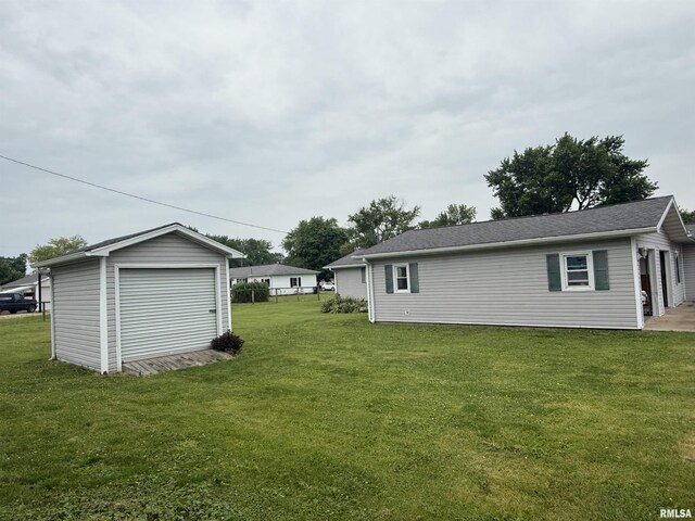 515 Morgan St, Chapin, IL 62628 - view of green lawn with an outdoor structure