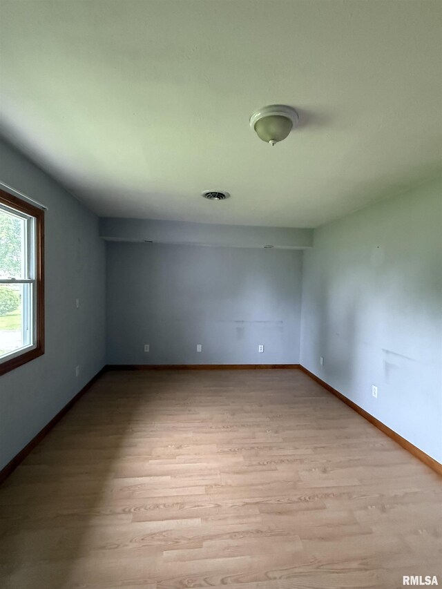 515 Morgan St, Chapin, IL 62628 - spare room with light wood finished floors and baseboards