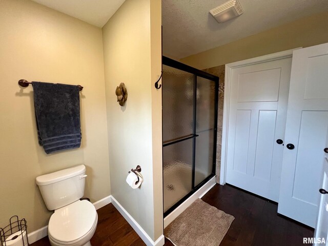 409 W Main St, Williamsville, IL 62693 - full bath with wood finished floors and a stall shower
