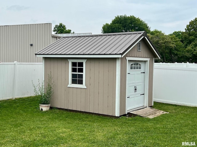 409 W Main St, Williamsville, IL 62693 - view of shed featuring a fenced backyard