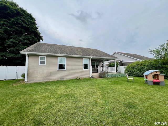 409 W Main St, Williamsville, IL 62693 - back of property with roof with shingles and crawl space