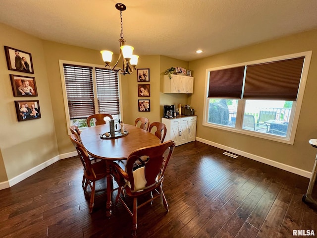 409 W Main St, Williamsville, IL 62693 - dining space featuring a chandelier, dark wood finished floors, and recessed lighting