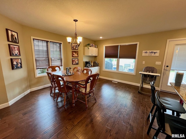 409 W Main St, Williamsville, IL 62693 - dining area with a chandelier, dark wood-style floors, and recessed lighting