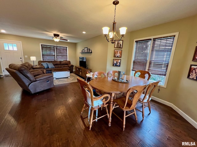 409 W Main St, Williamsville, IL 62693 - dining area with dark wood-style flooring, a chandelier, recessed lighting, and a ceiling fan