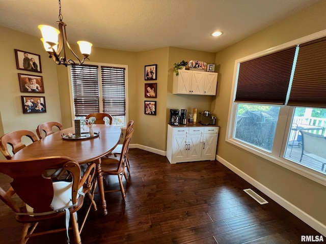 409 W Main St, Williamsville, IL 62693 - dining room with dark wood-style flooring, a chandelier, and recessed lighting