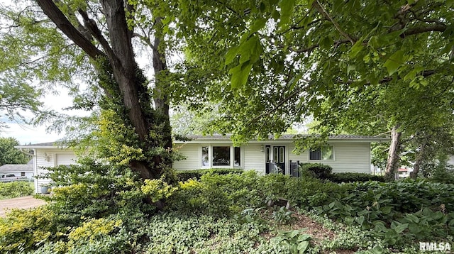 131 E Willard St, Wataga, IL 61488 - view of front of property with an attached garage