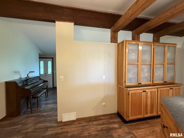 131 E Willard St, Wataga, IL 61488 - dining space with beam ceiling and dark wood finished floors