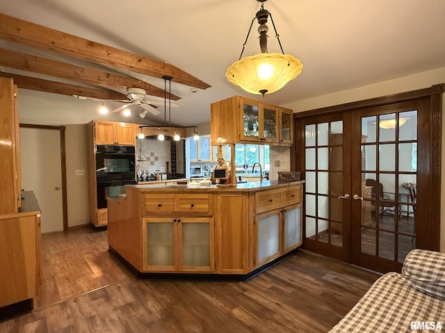 131 E Willard St, Wataga, IL 61488 - kitchen with french doors, dark wood finished floors, glass insert cabinets, a peninsula, and a sink
