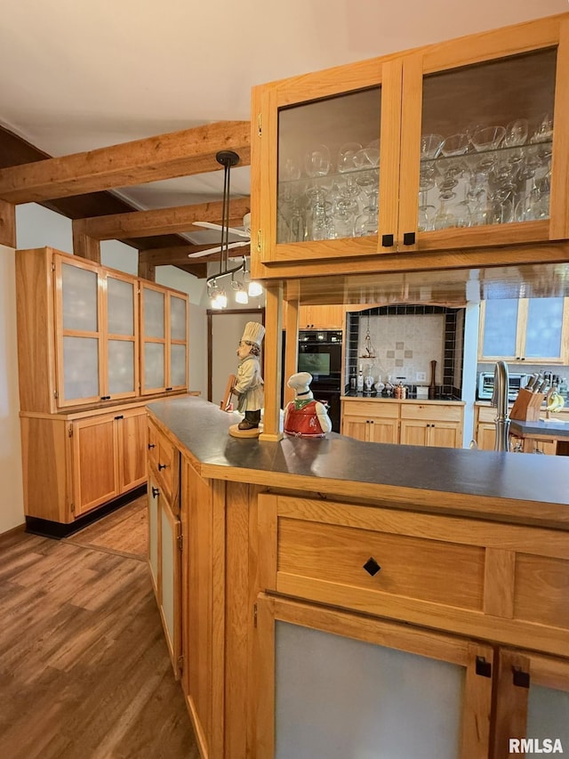 131 E Willard St, Wataga, IL 61488 - bar area featuring wood finished floors, beam ceiling, and decorative light fixtures
