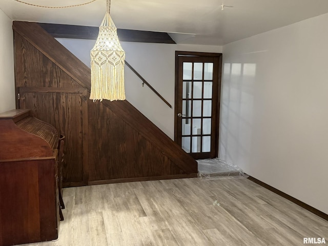 131 E Willard St, Wataga, IL 61488 - unfurnished dining area featuring wood finished floors and baseboards