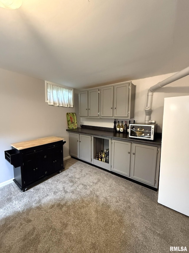 131 E Willard St, Wataga, IL 61488 - indoor bar with carpet floors and baseboards
