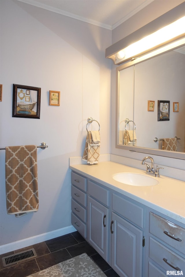 255 S Soangetaha Rd, Galesburg, IL 61401 - bathroom featuring crown molding, vanity, baseboards, and tile patterned floors