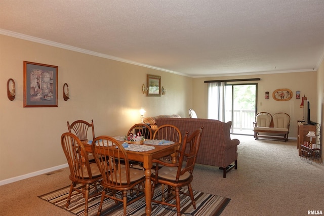 255 S Soangetaha Rd, Galesburg, IL 61401 - carpeted dining room featuring crown molding, baseboards, and a textured ceiling