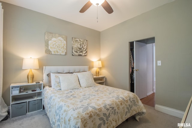 306 N Jefferson St, Abingdon, IL 61410 - carpeted bedroom featuring baseboards and a ceiling fan