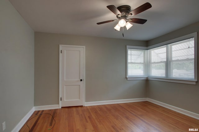 2016 Sycamore St, Quincy, IL 62301 - empty room with light wood finished floors, baseboards, and ceiling fan