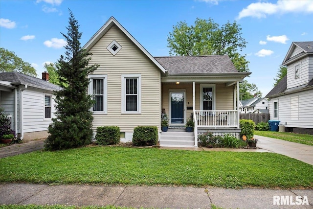 1412 Walnut St, Springfield, IL 62704 - view of front of property featuring covered porch, a front lawn, and a shingled roof