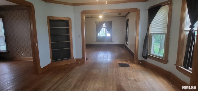 1262 N Broad St, Galesburg, IL 61401 - entrance foyer with wood finished floors, baseboards, and ornamental molding