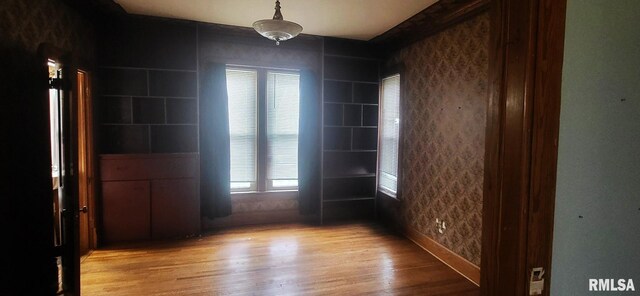 1262 N Broad St, Galesburg, IL 61401 - empty room featuring light wood-style flooring and baseboards