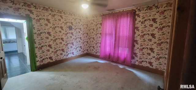 1262 N Broad St, Galesburg, IL 61401 - unfurnished room with wallpapered walls and baseboards