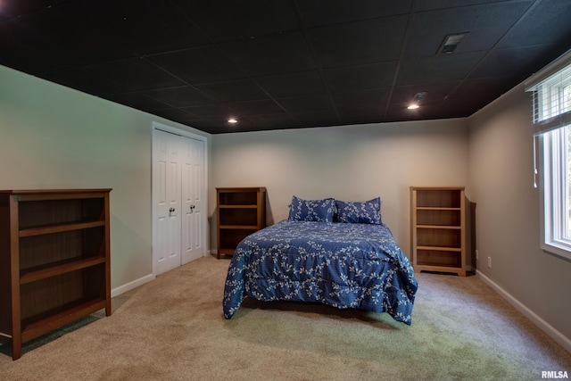 507 W Fairway Dr, Quincy, IL 62305 - carpeted bedroom with baseboards and a closet