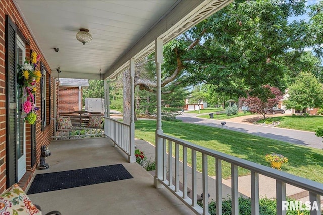 7 Marshall Ct, Springfield, IL 62563 - covered porch with a yard