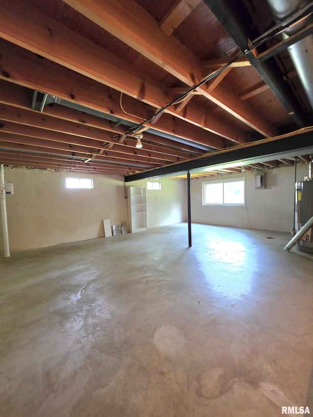 1246 Curtis Creek Rd, Quincy, IL 62301 - below grade area featuring plenty of natural light and water heater