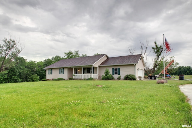 2044 N 1200th Ave, Liberty, IL 62347 - ranch-style house featuring covered porch, a garage, a front yard, and a shingled roof