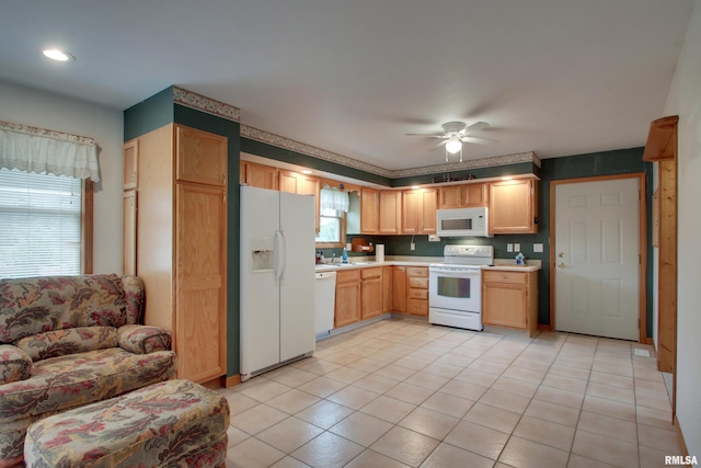 2044 N 1200th Ave, Liberty, IL 62347 - kitchen with white appliances, light countertops, healthy amount of natural light, and a ceiling fan