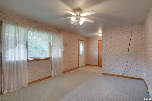 2044 N 1200th Ave, Liberty, IL 62347 - carpeted empty room with ceiling fan and wallpapered walls