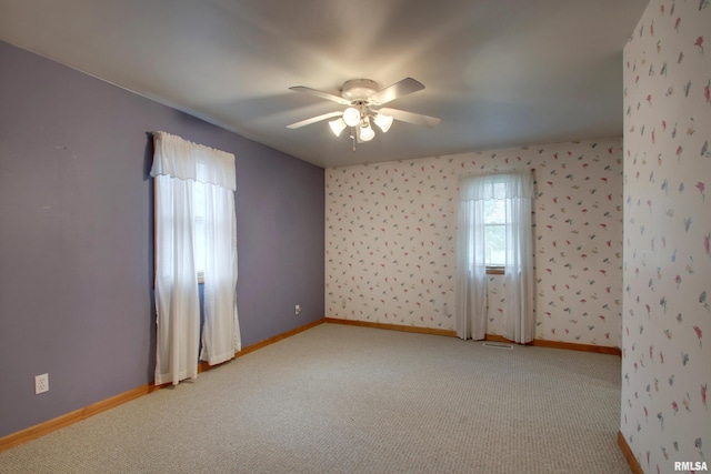 2044 N 1200th Ave, Liberty, IL 62347 - carpeted empty room with a ceiling fan and baseboards