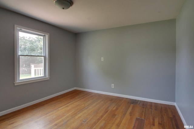 2317 Harrison St, Quincy, IL 62301 - empty room featuring baseboards and wood finished floors