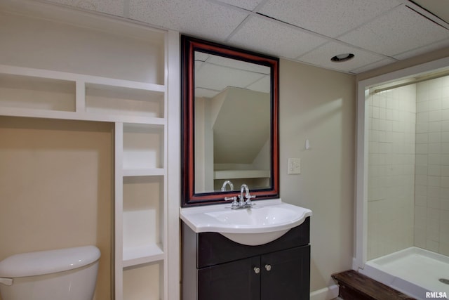 2317 Harrison St, Quincy, IL 62301 - full bath featuring vanity, a stall shower, toilet, and a drop ceiling