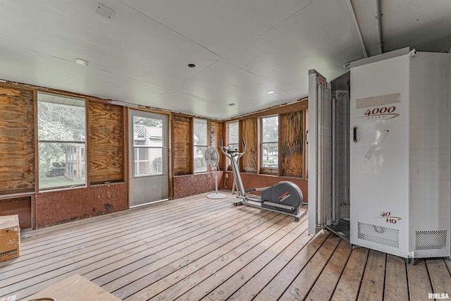 1354 Airport Rd, Lincoln, IL 62656 - exercise room featuring hardwood / wood-style floors, healthy amount of natural light, and lofted ceiling