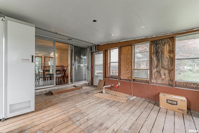 1354 Airport Rd, Lincoln, IL 62656 - unfurnished sunroom featuring healthy amount of natural light and cooling unit