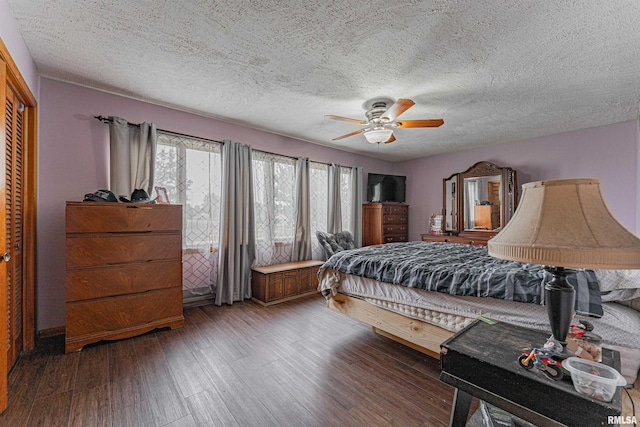 1354 Airport Rd, Lincoln, IL 62656 - bedroom with a textured ceiling, wood finished floors, and ceiling fan