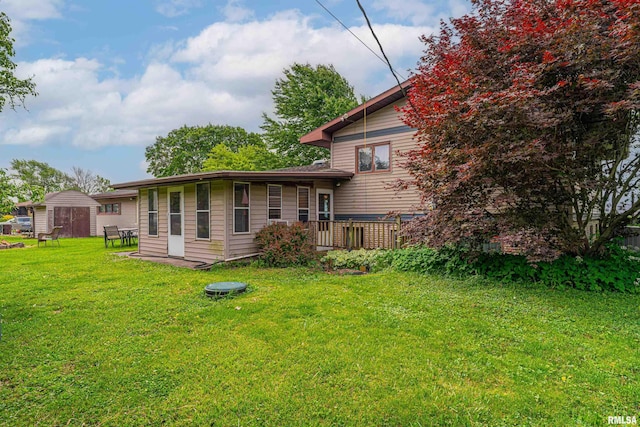 1354 Airport Rd, Lincoln, IL 62656 - back of house with a yard