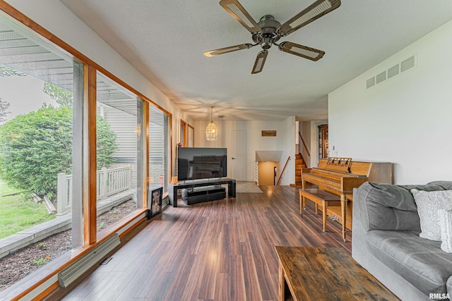 1354 Airport Rd, Lincoln, IL 62656 - living area featuring ceiling fan, stairs, and wood finished floors