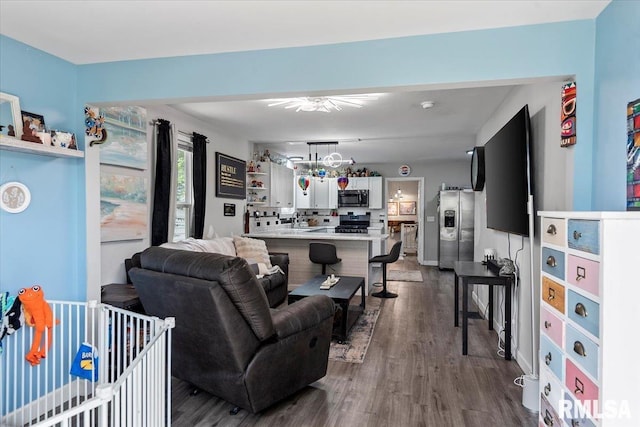 2705 S Walnut St, Springfield, IL 62704 - living room with dark wood finished floors and a ceiling fan