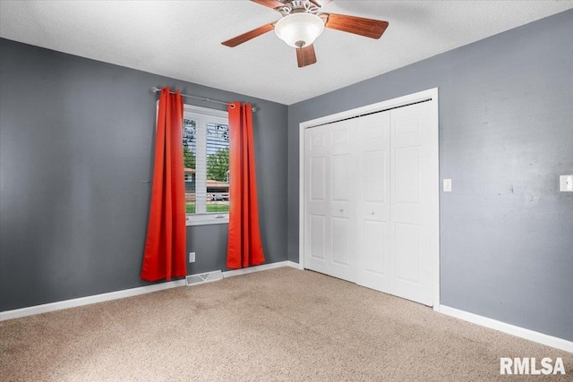 69 Axline Rd, Chatham, IL 62629 - unfurnished bedroom with carpet floors, a ceiling fan, and a closet